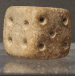 Terracotta dice from Mohenjo-daro (Pakistan), 2500–1900 BC. Photographed at the Ashmolean Museum, Oxford by Zunkir; image cropped. Wikimedia Commons, Attribution-Share Alike 4.0 International License.
